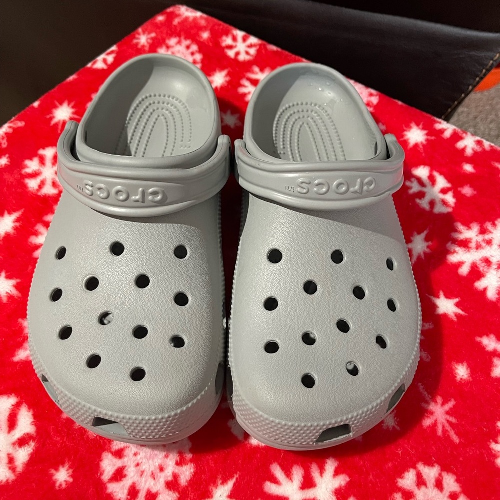 Crocs: gray, women’s size 9, men’s size 7